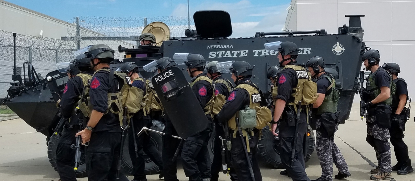 armored swat team and armored vehicle