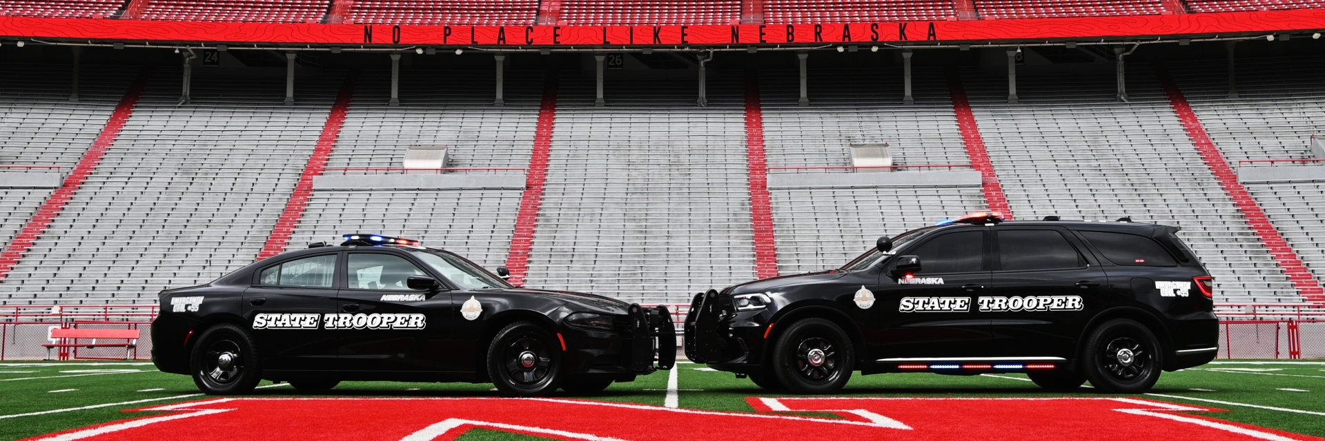 Two patrol vehicles inside Memorial Stadium