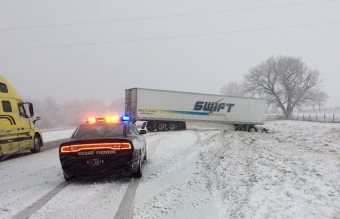 NSP cruiser responding to crash in the snow