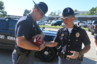 Husker Game Ball Handoff