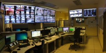 security room full of computers and monitors