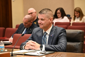 Colonel Bryan Waugh testifies before the Nebraska Legislature