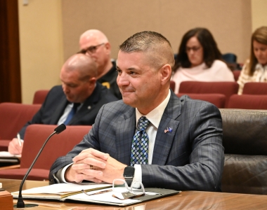 Colonel Bryan Waugh testifies before the Nebraska Legislature